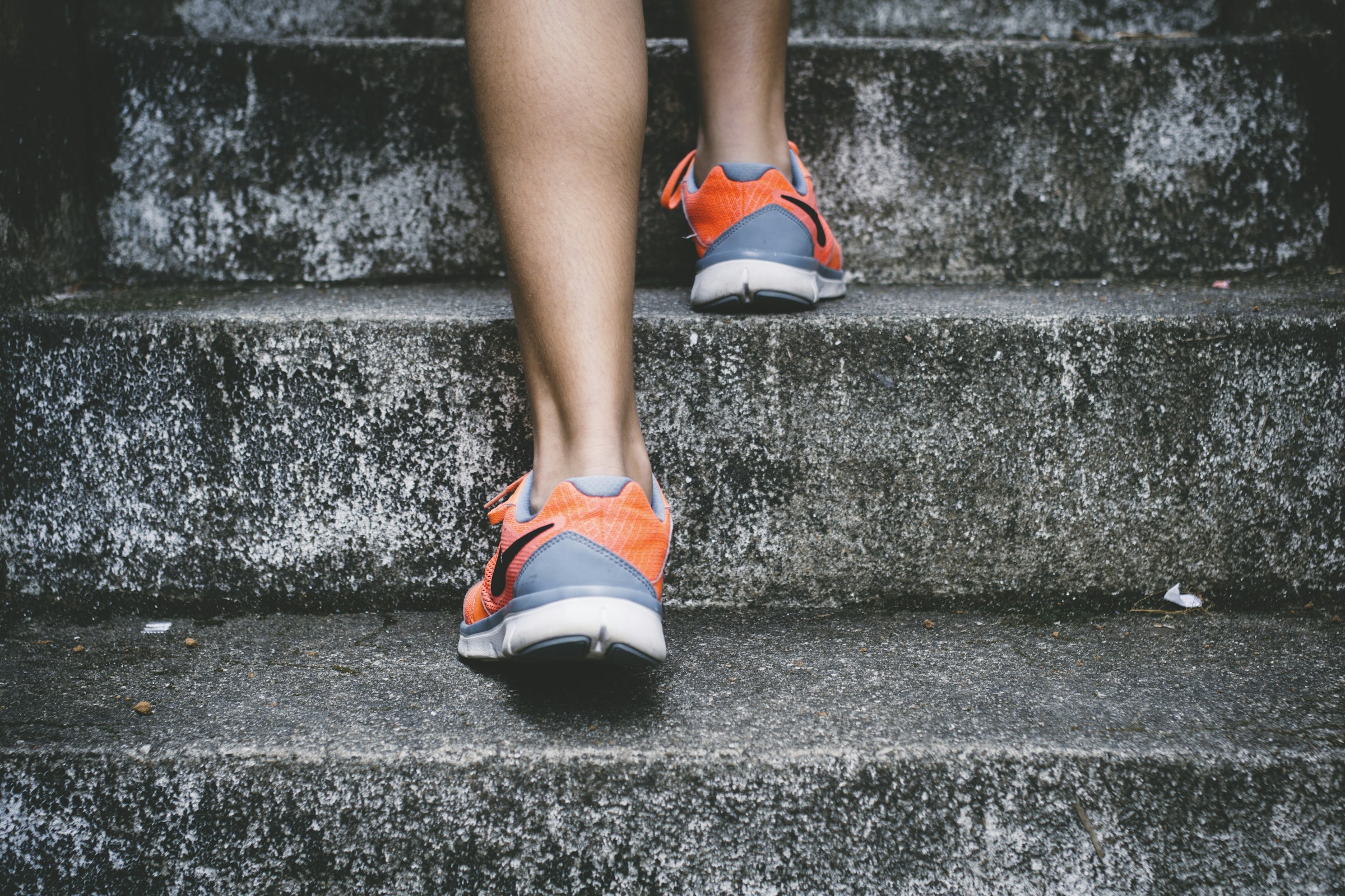 Person walking at an easy pace outdoors